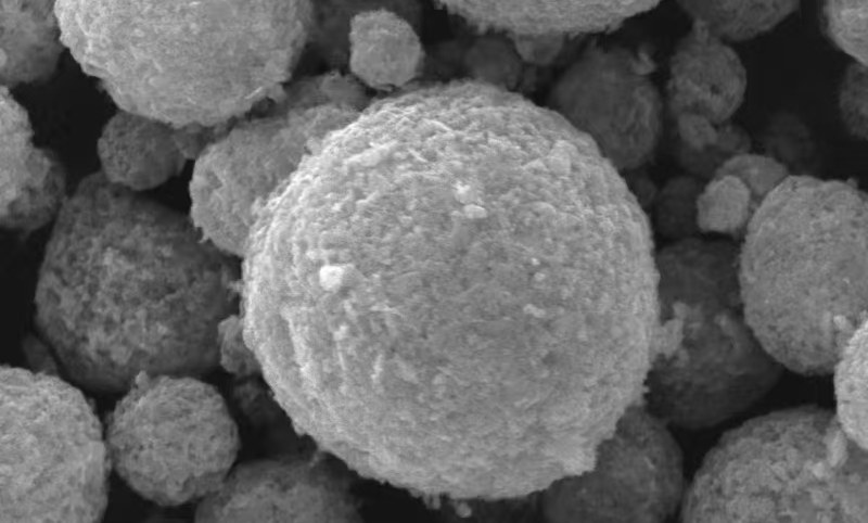 Spherical silicon anode particles under the electron microscope before SWCNT addition, uncoated surfaces and point contacts only